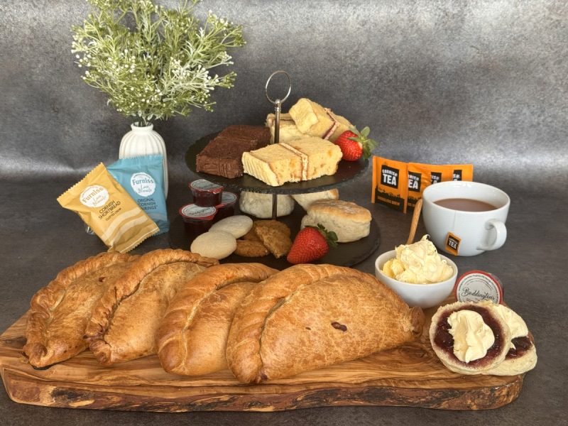 Cream tea hamper with pasties, scones, jam, and biscuits